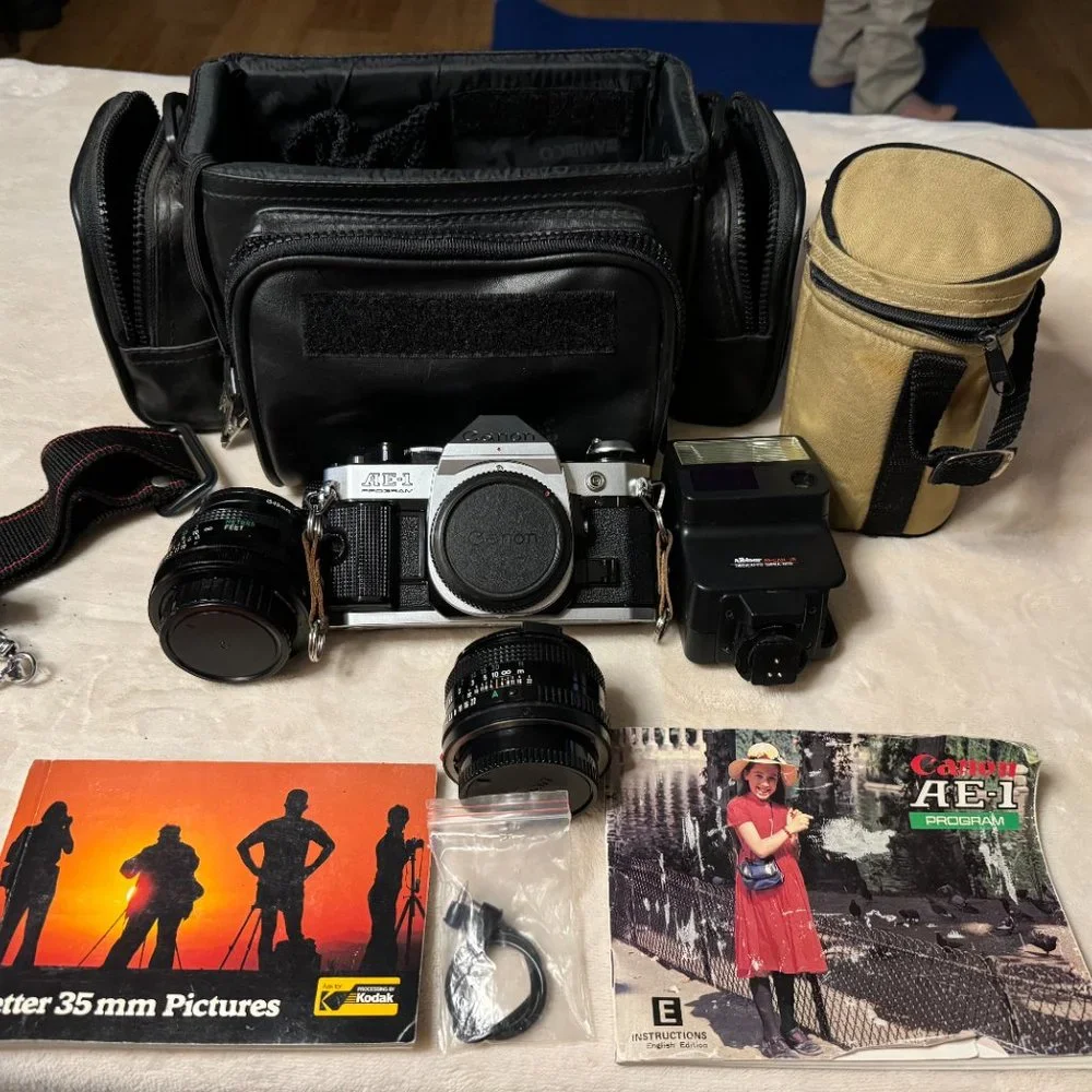 Canon AE -1 Program 35 mm film camera original manuals 1 owner